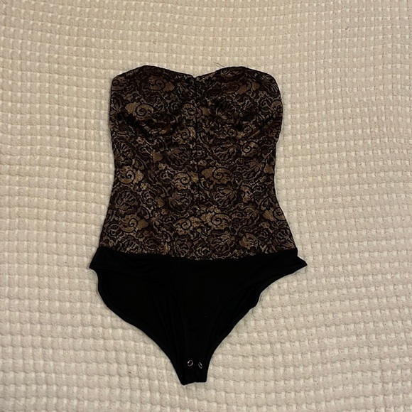 Forever 21 Tops - Forever 21 Lace Corset Bodysuit. Medium. Snap close, strapless. Copper lining.